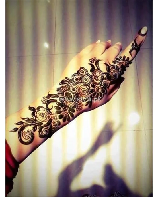 Luxurious Bead And Plait Covering Back Hand Mehndi Design